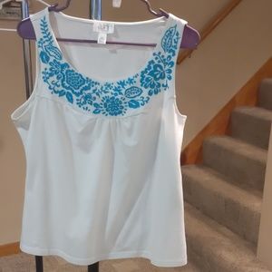 White sleeveless t-shirt with turquoise embroidery